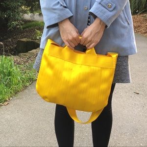 Brand new yellow seatbelt bag